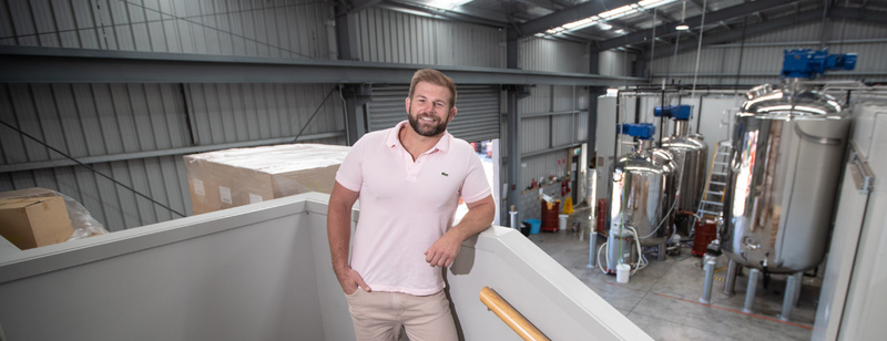 Egmont Honey family beekeepers working with hives